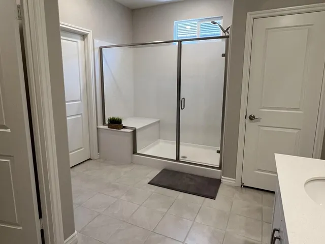 a room with furniture and a mirror