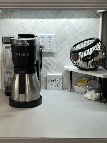 a spacious bedroom with a bed and a large mirror