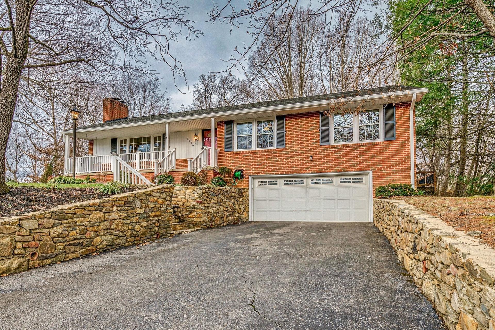 3586 Forester Road Southwest Roanoke, VA 24018 - Photo 2 of 51 front view of a house with a yard