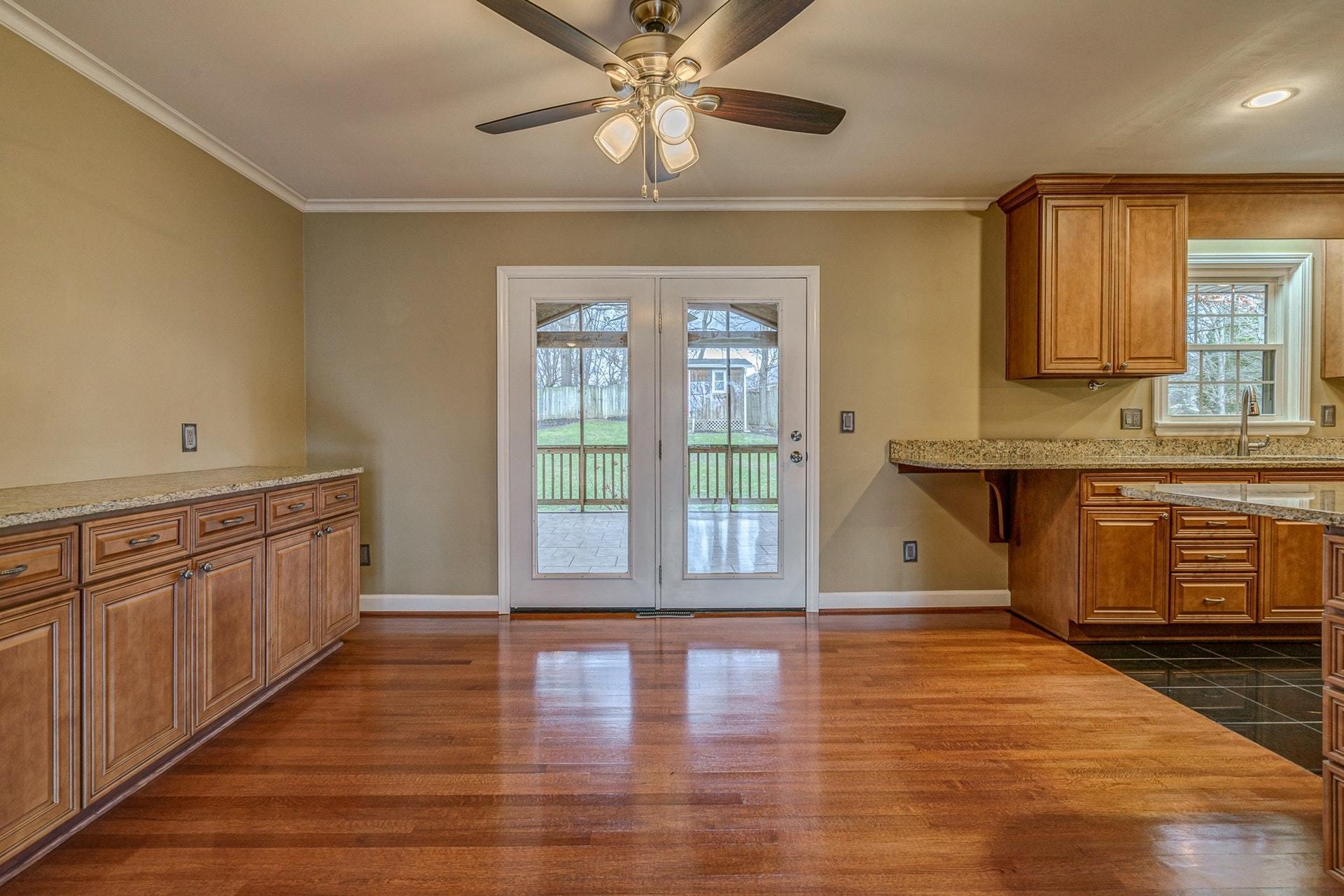 3586 Forester Road Southwest Roanoke, VA 24018 - Photo 11 of 51 a view of a kitchen with wooden floor and a kitchen space with a sink
