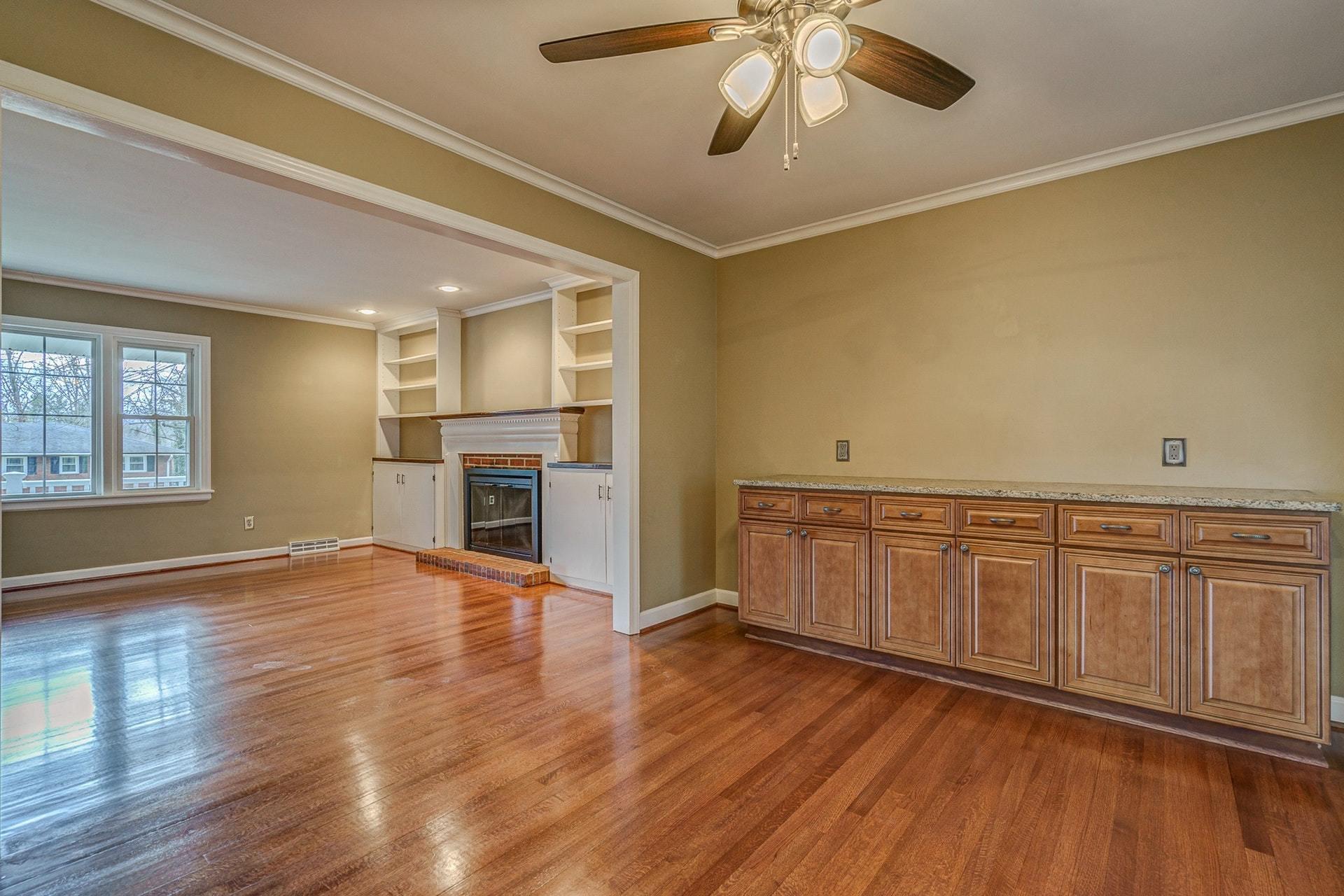 3586 Forester Road Southwest Roanoke, VA 24018 - Photo 12 of 51 a view of a kitchen with wooden floor and a ceiling fan
