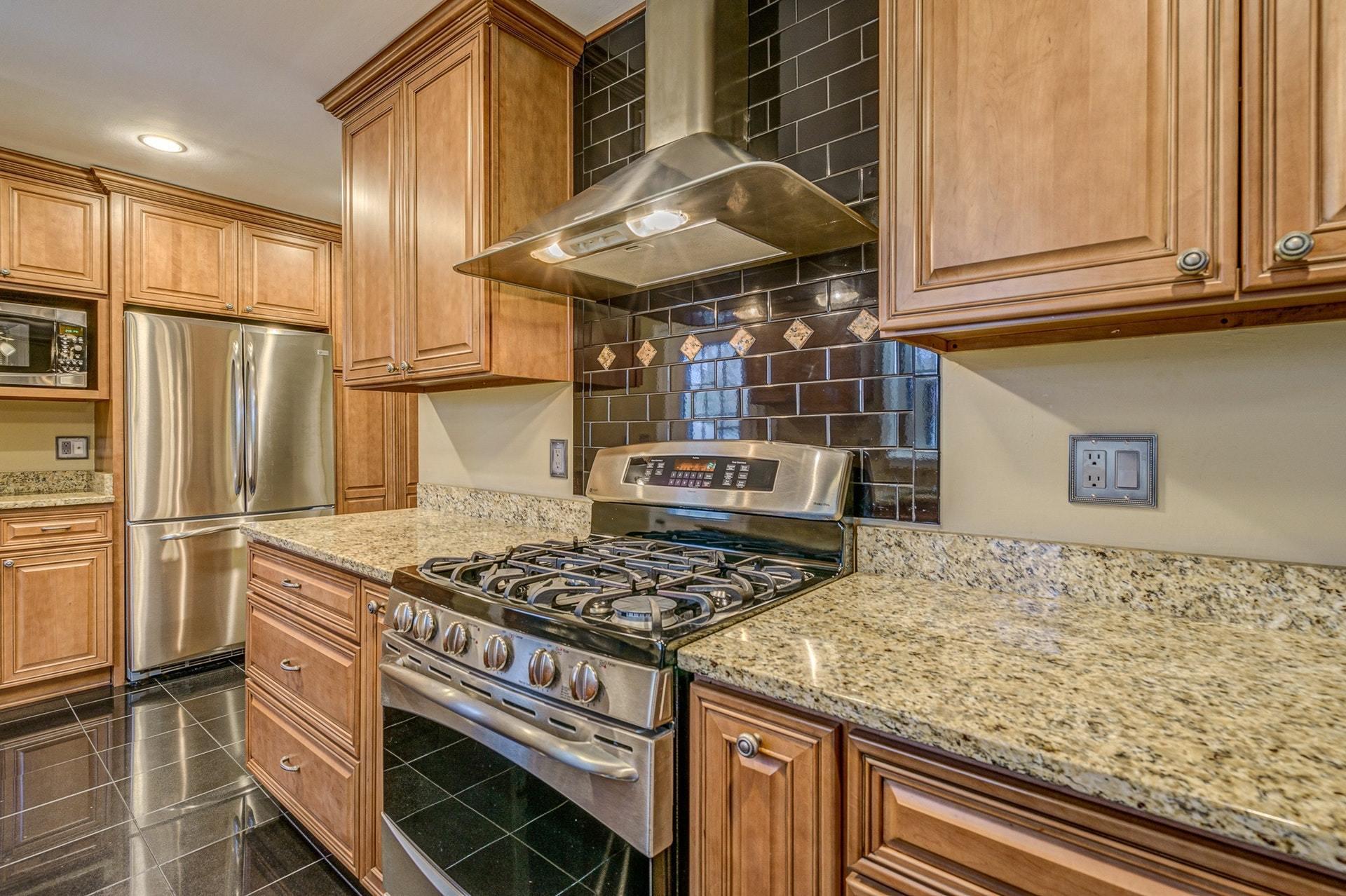 3586 Forester Road Southwest Roanoke, VA 24018 - Photo 14 of 51 a kitchen with stainless steel appliances granite countertop a refrigerator and a stove
