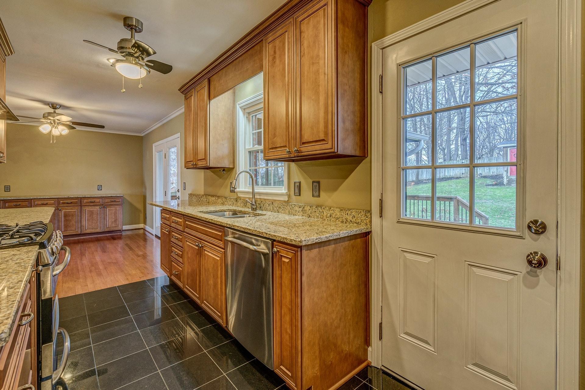 3586 Forester Road Southwest Roanoke, VA 24018 - Photo 15 of 51 a kitchen with stainless steel appliances granite countertop a sink and a stove