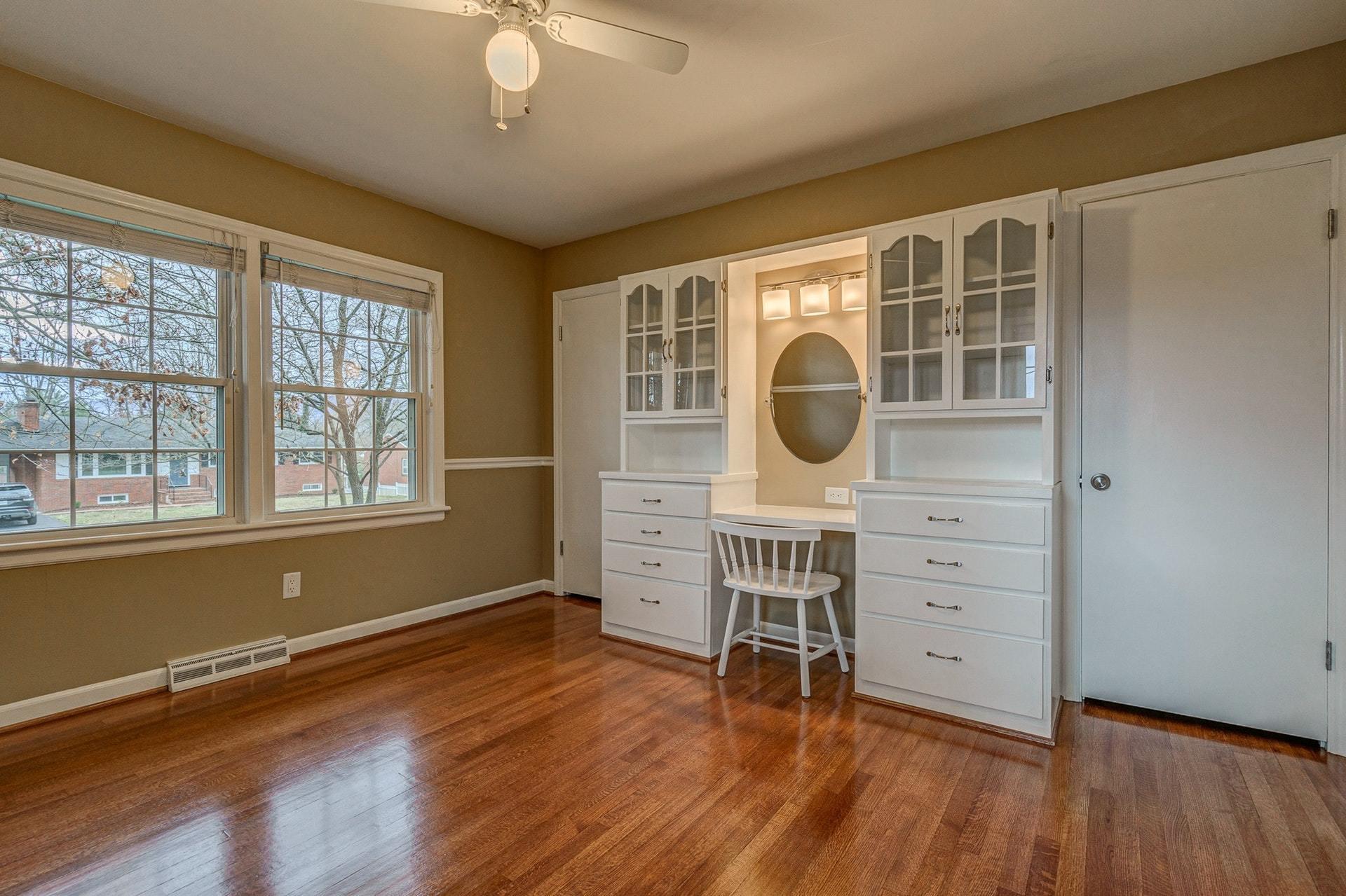 3586 Forester Road Southwest Roanoke, VA 24018 - Photo 22 of 51 an empty room with wooden floor and windows