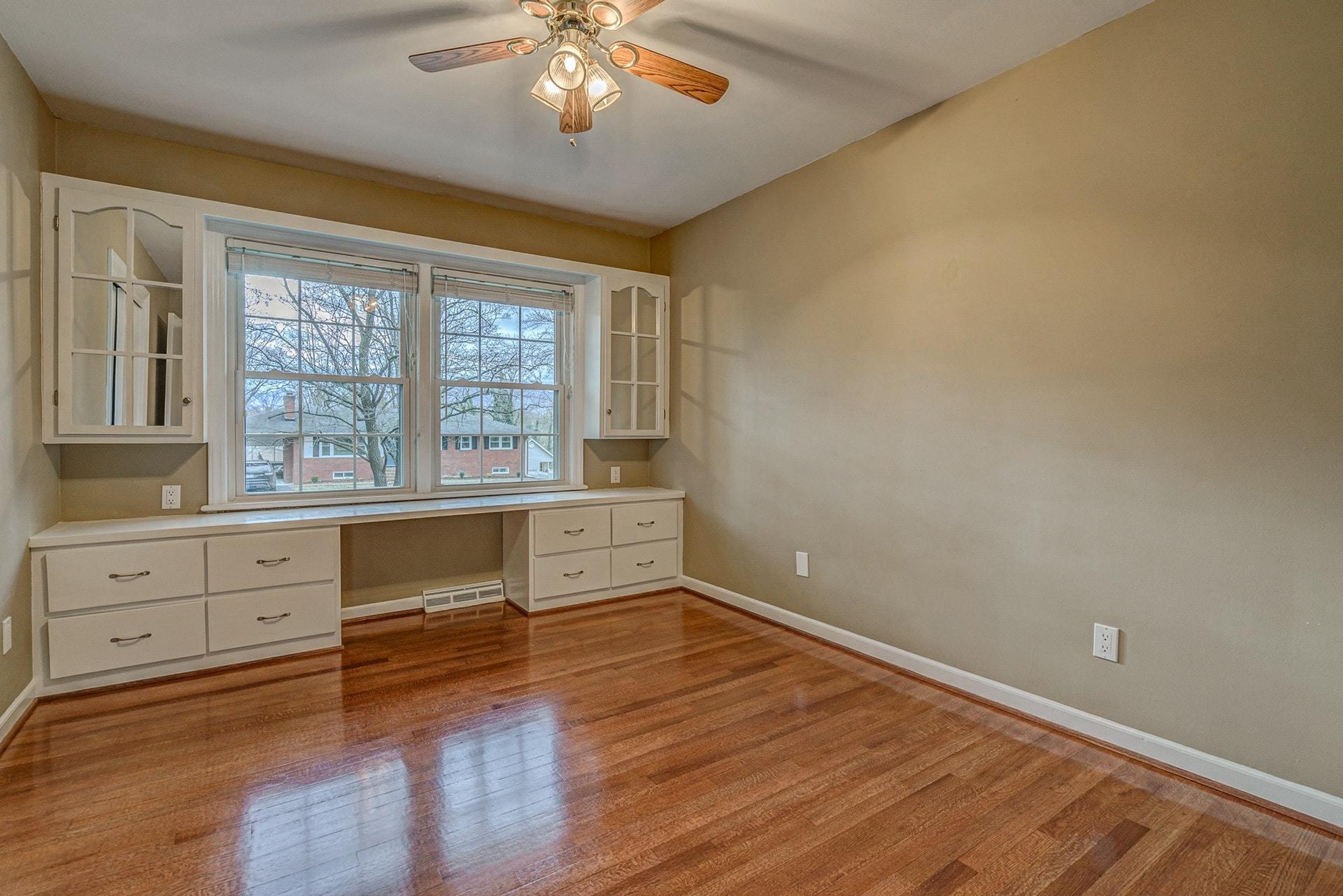 3586 Forester Road Southwest Roanoke, VA 24018 - Photo 23 of 51 an empty room with wooden floor and windows