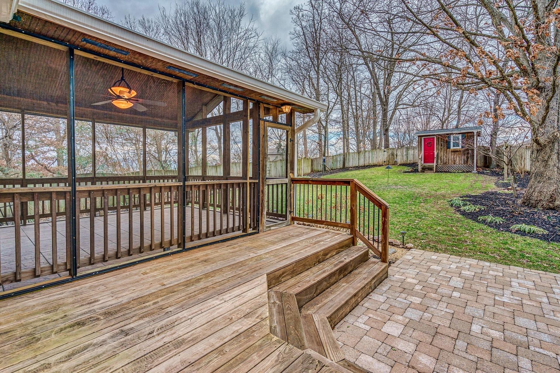 3586 Forester Road Southwest Roanoke, VA 24018 - Photo 41 of 51 a view of a house with a small yard next to a patio