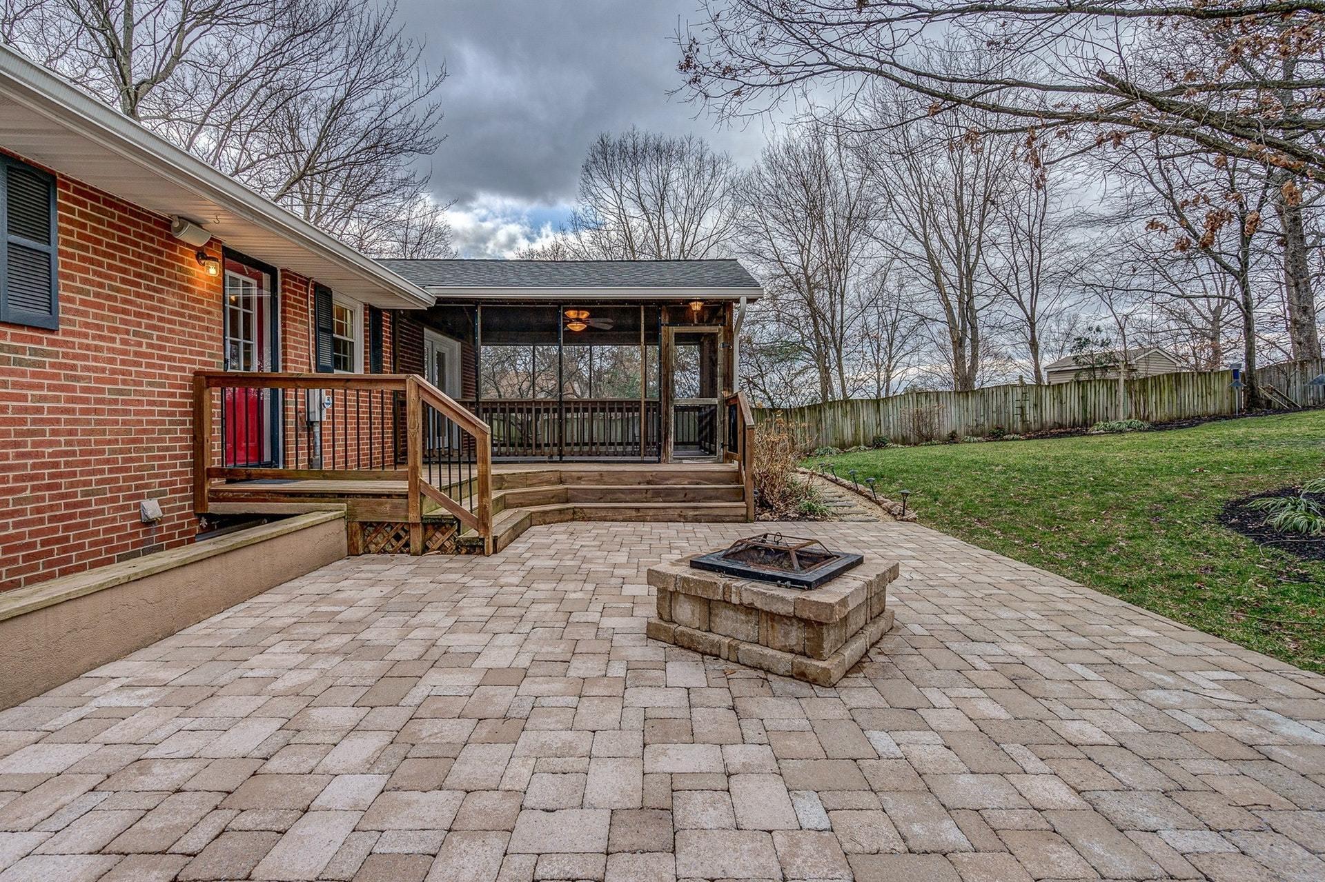 3586 Forester Road Southwest Roanoke, VA 24018 - Photo 45 of 51 a backyard of a house with barbeque oven and trees