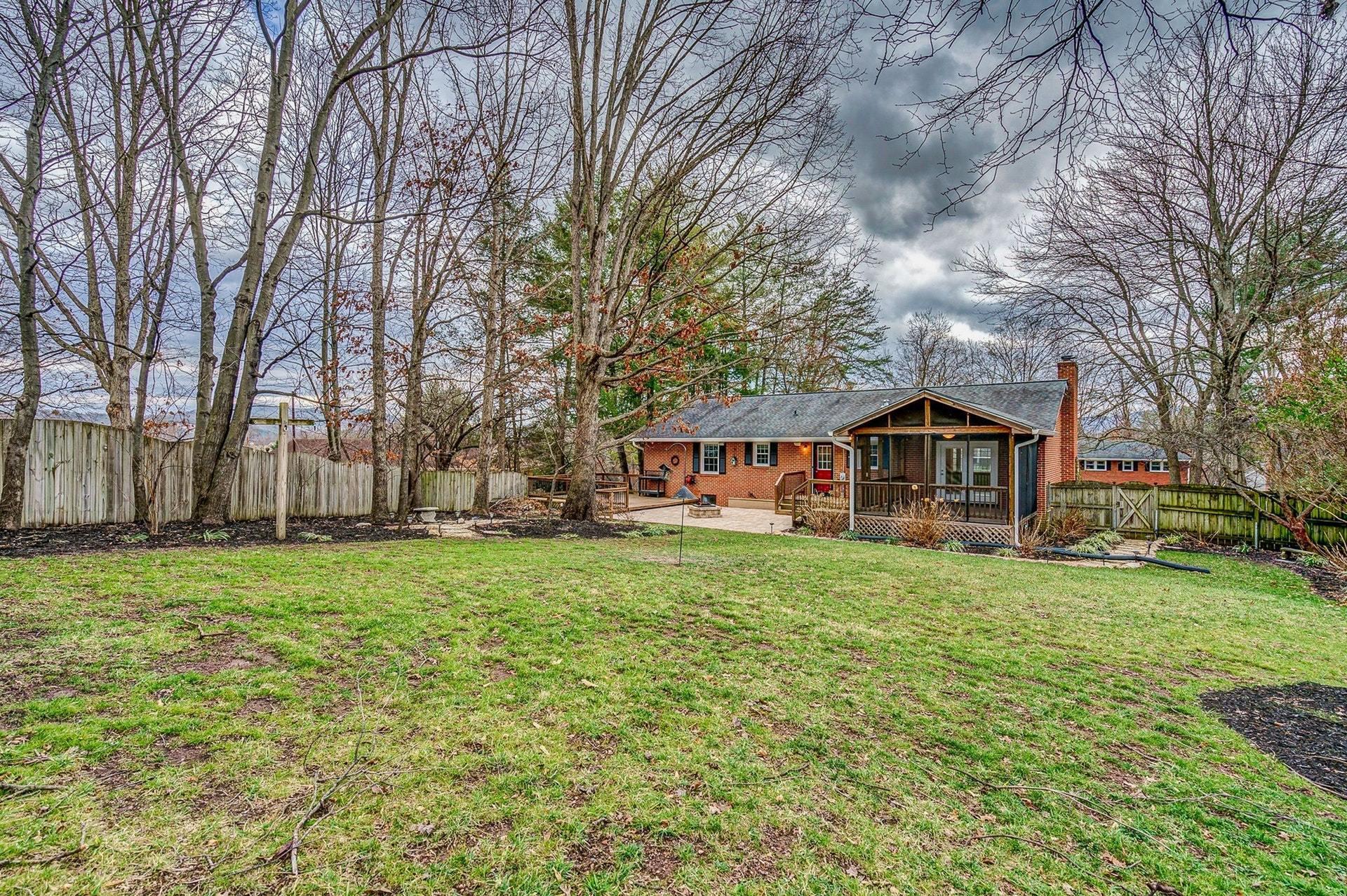 3586 Forester Road Southwest Roanoke, VA 24018 - Photo 49 of 51 a front view of a house with yard and green space