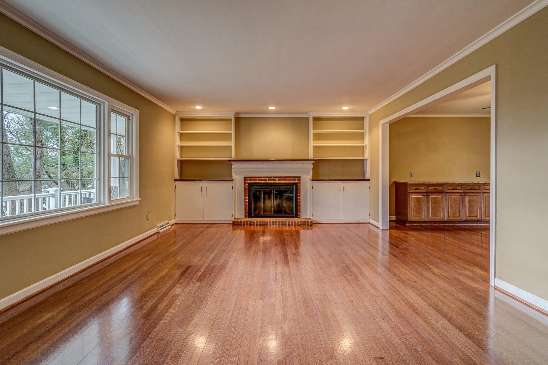 3586 Forester Road Southwest Roanoke, VA 24018 - Photo 8 of 51 a view of empty room with wooden floor and fireplace