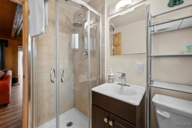 a bed room with a bed and a window