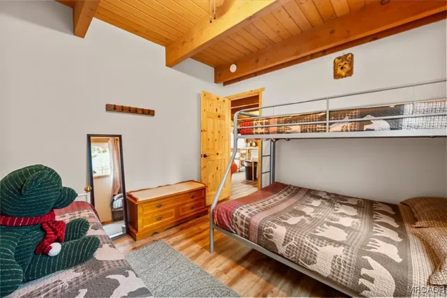 a view of kitchen with furniture and wooden floor