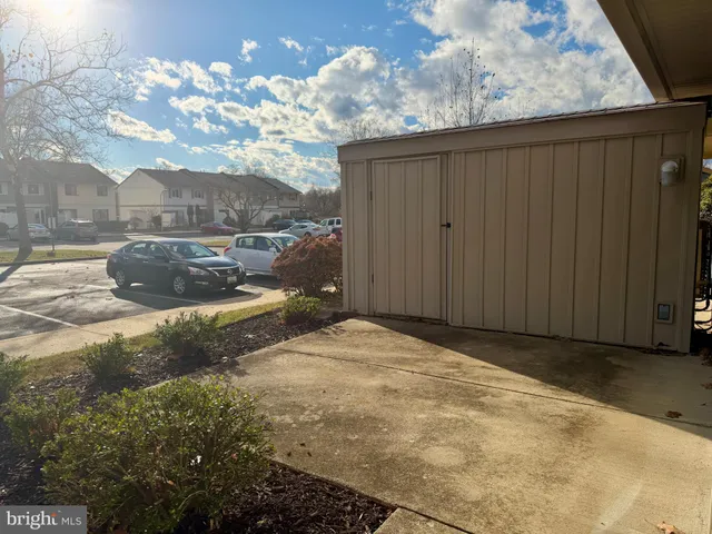 a view of a backyard of the house