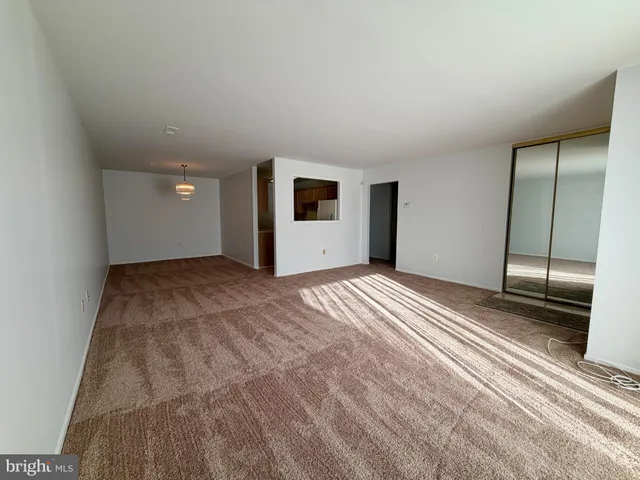 a view of a livingroom with a bedroom