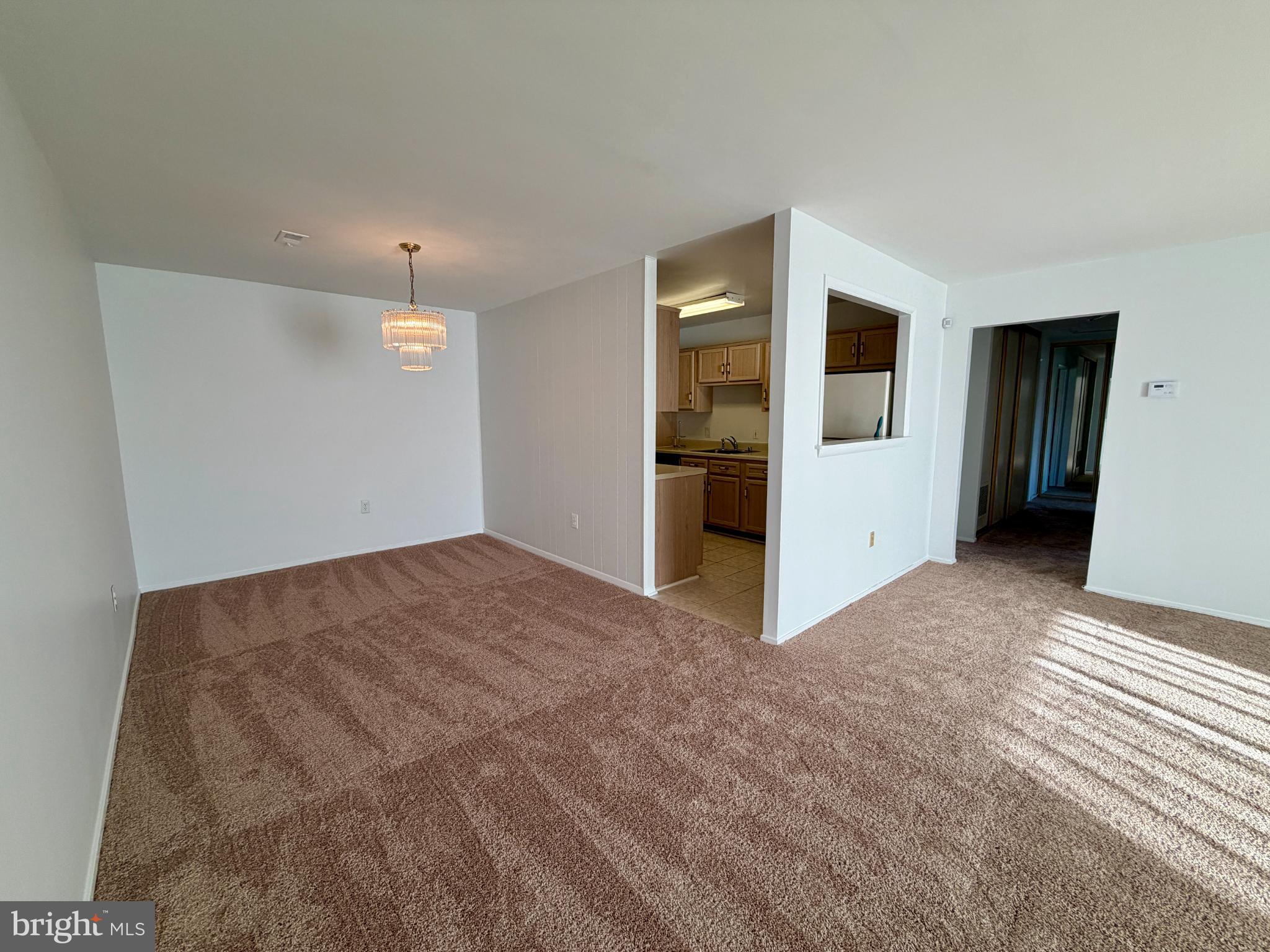 3103 Beckenham Court, Unit 252D Silver Spring, MD 20906 - Photo 4 of 13 a view of a livingroom with a staircase