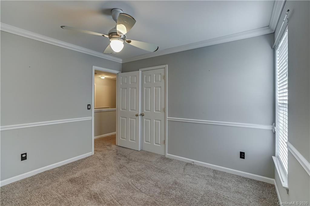 7243 Cascading Pines Drive Tega Cay, SC 29708 - Photo 20 of 33 a view of an empty room
