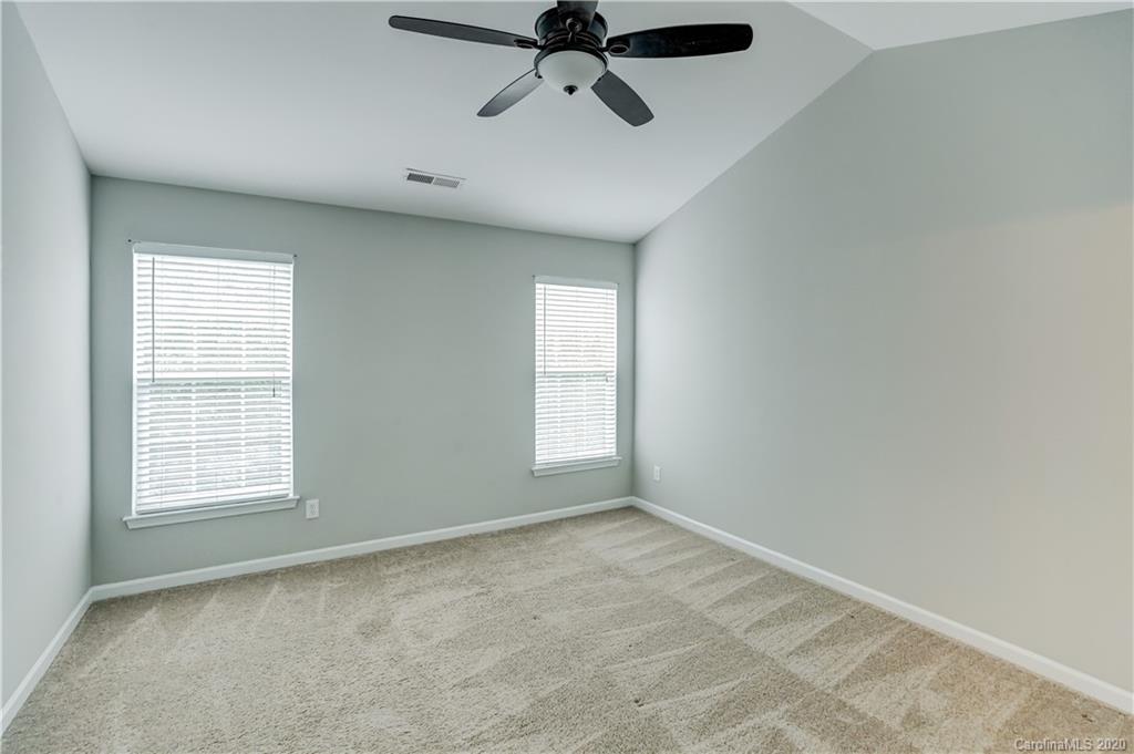 7243 Cascading Pines Drive Tega Cay, SC 29708 - Photo 21 of 33 a view of empty room with ceiling fan