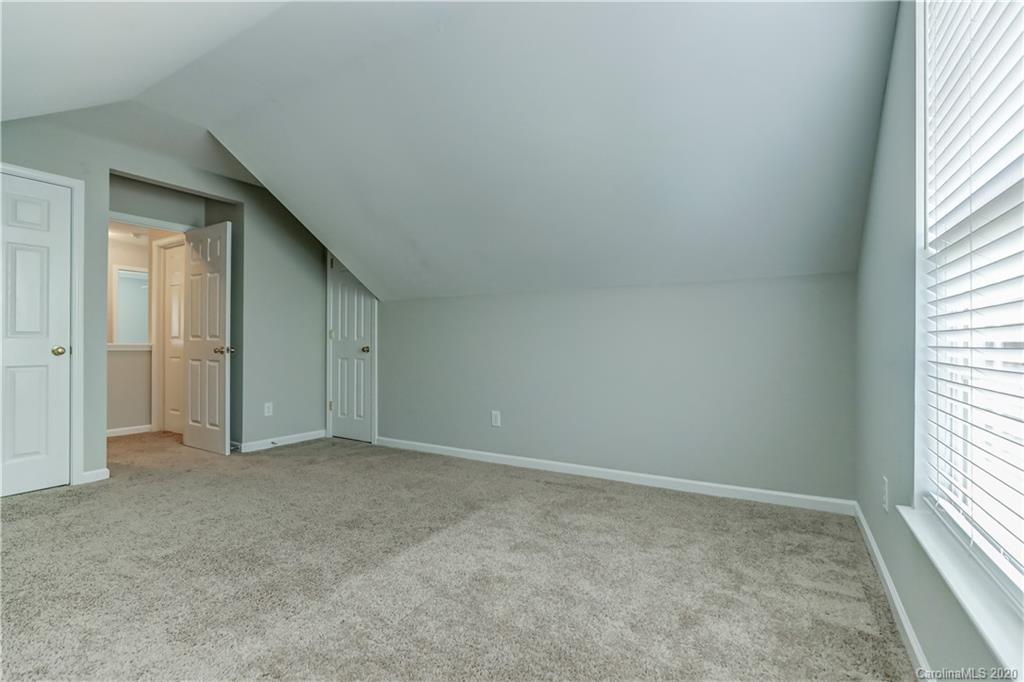 7243 Cascading Pines Drive Tega Cay, SC 29708 - Photo 28 of 33 an empty room with windows