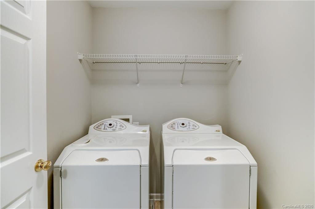 7243 Cascading Pines Drive Tega Cay, SC 29708 - Photo 29 of 33 a utility room with dryer and washer