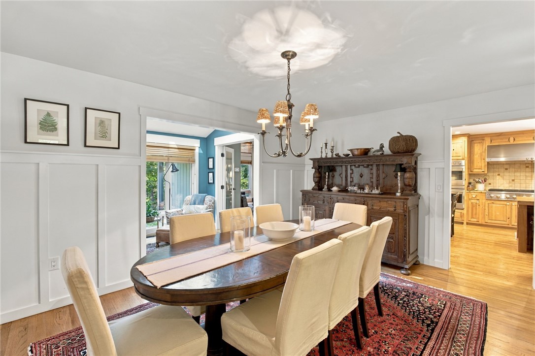 604 Ridgecrest Drive Clemson, SC 29631 - Photo 16 of 50 Rich wainscoting and warm wood floors define this classic formal dining space.