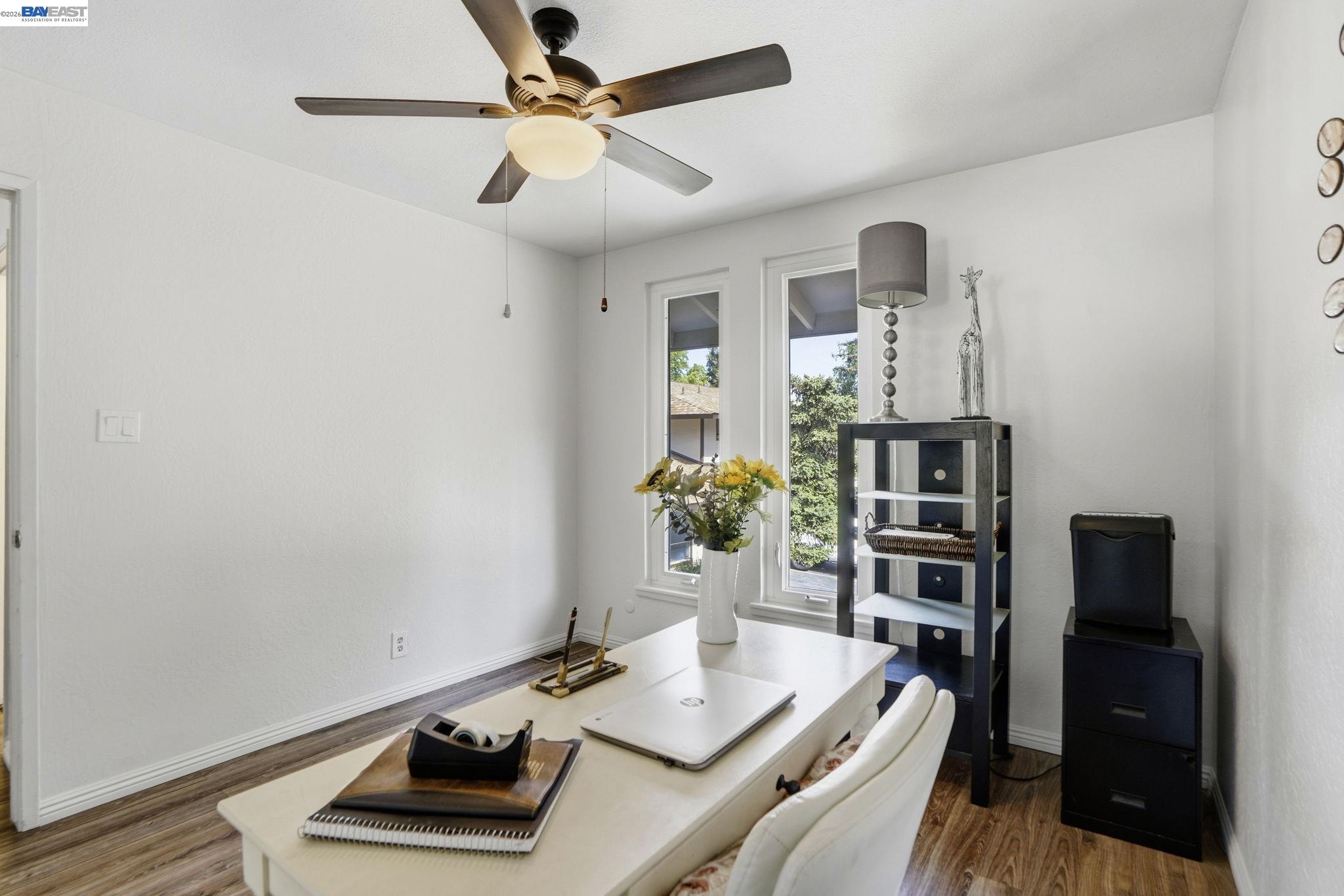 5505 Roundtree Drive, Unit B Concord, CA 94521 - Photo 14 of 29 a living room with furniture and a bookshelf