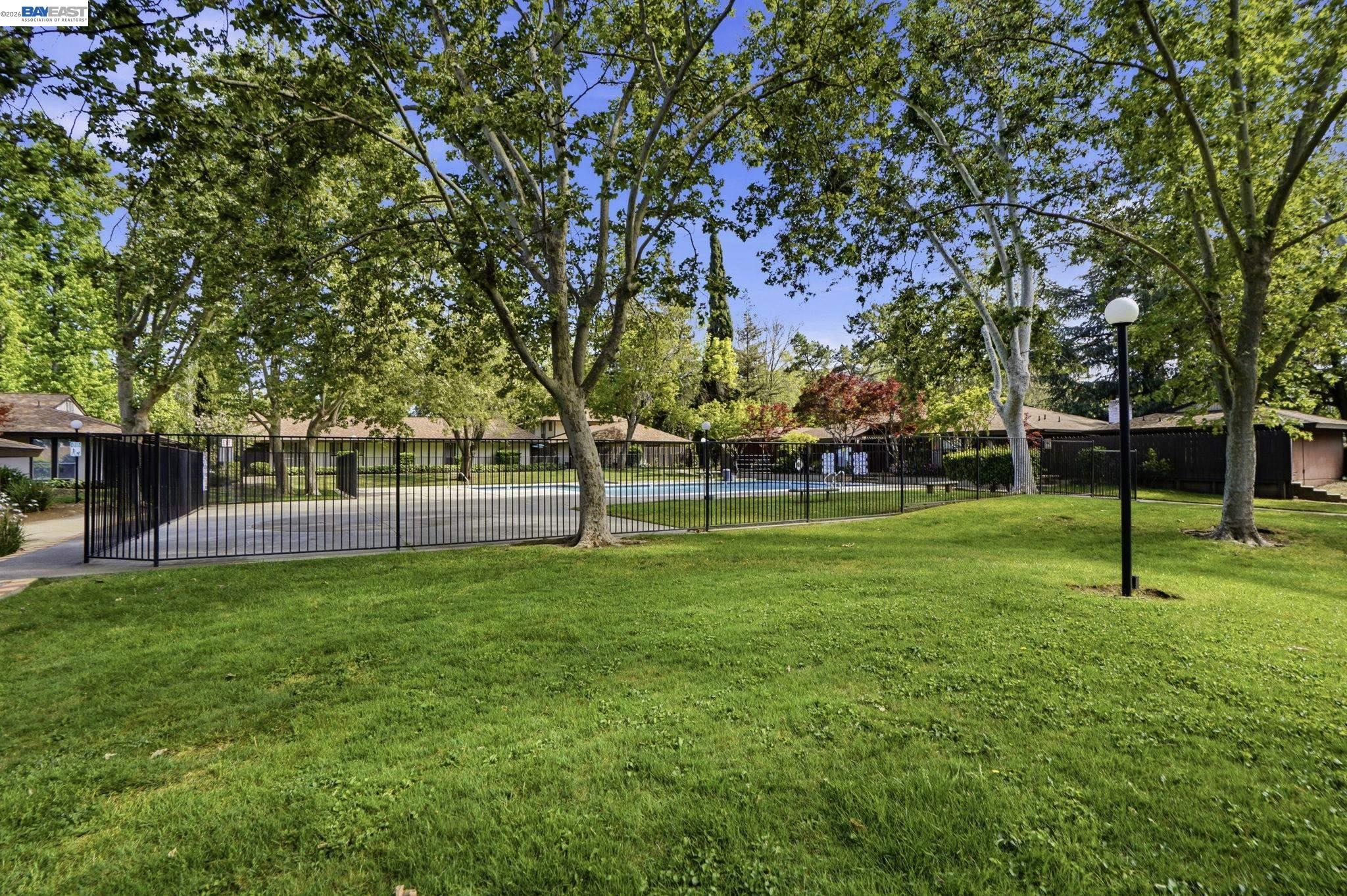 5505 Roundtree Drive, Unit B Concord, CA 94521 - Photo 27 of 29 a view of a park with a tree