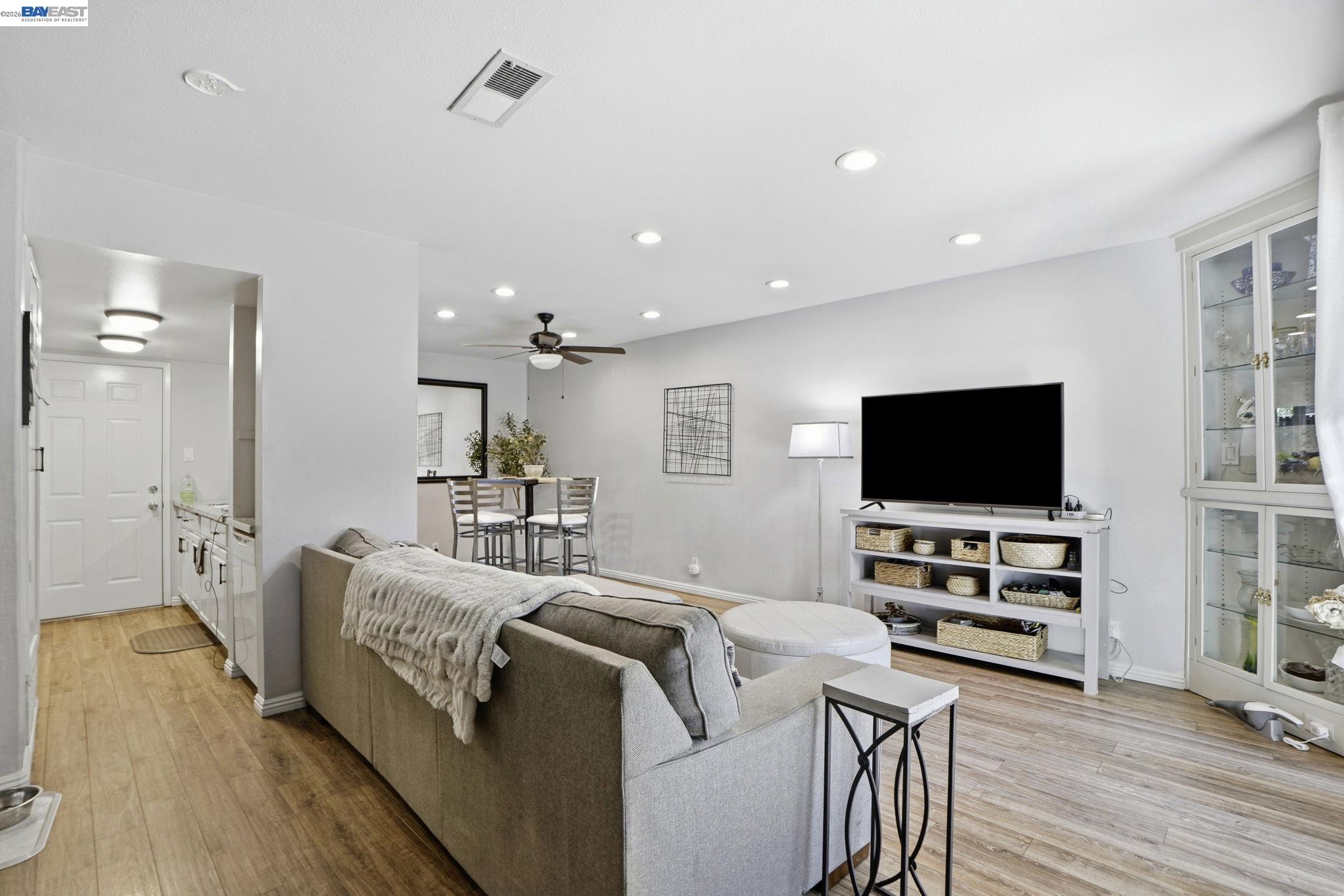 5505 Roundtree Drive, Unit B Concord, CA 94521 - Photo 6 of 29 a living room with furniture and a flat screen tv
