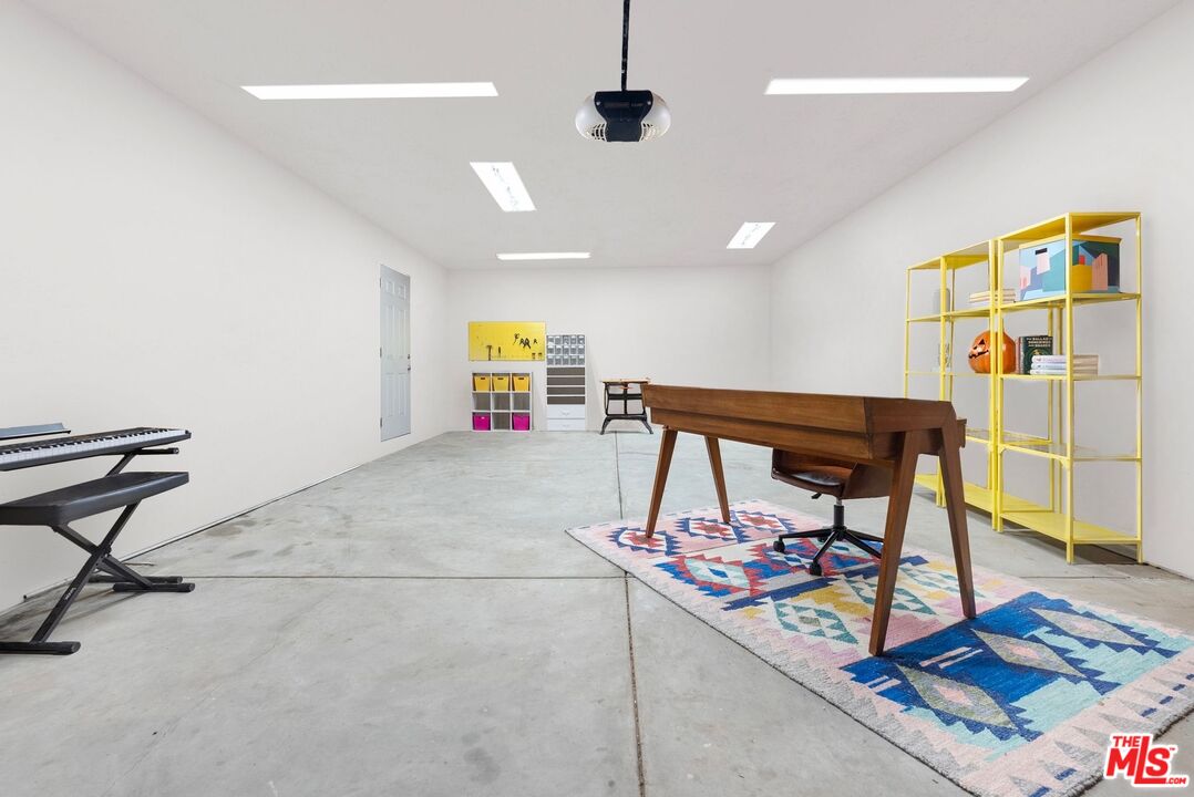 5752 Vesper Avenue Van Nuys, CA 91411 - Photo 24 of 30 a view of a hallway with workspace