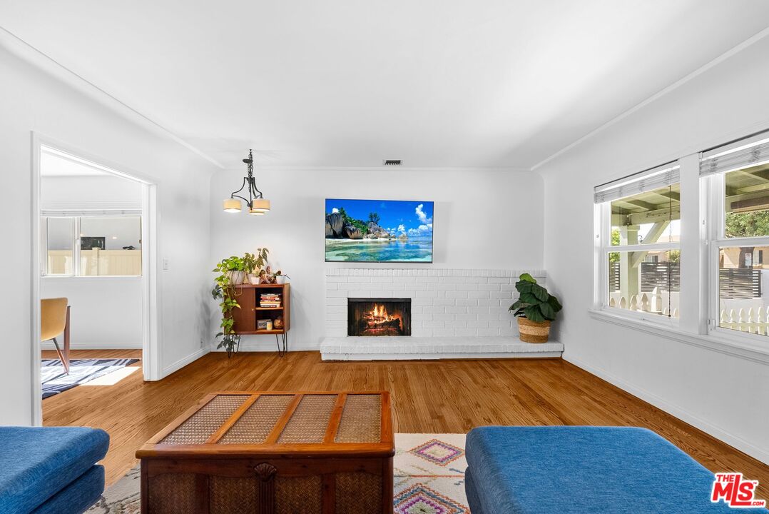 5752 Vesper Avenue Van Nuys, CA 91411 - Photo 6 of 30 a room with pool table and a window