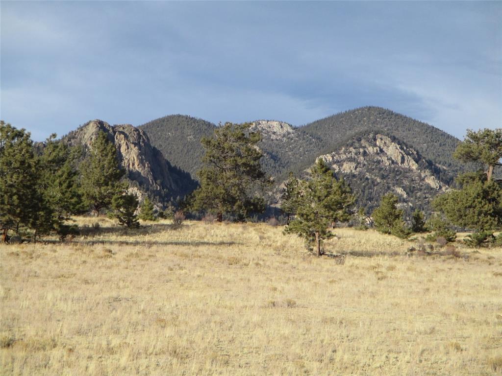a view of mountain view with mountains in the background
