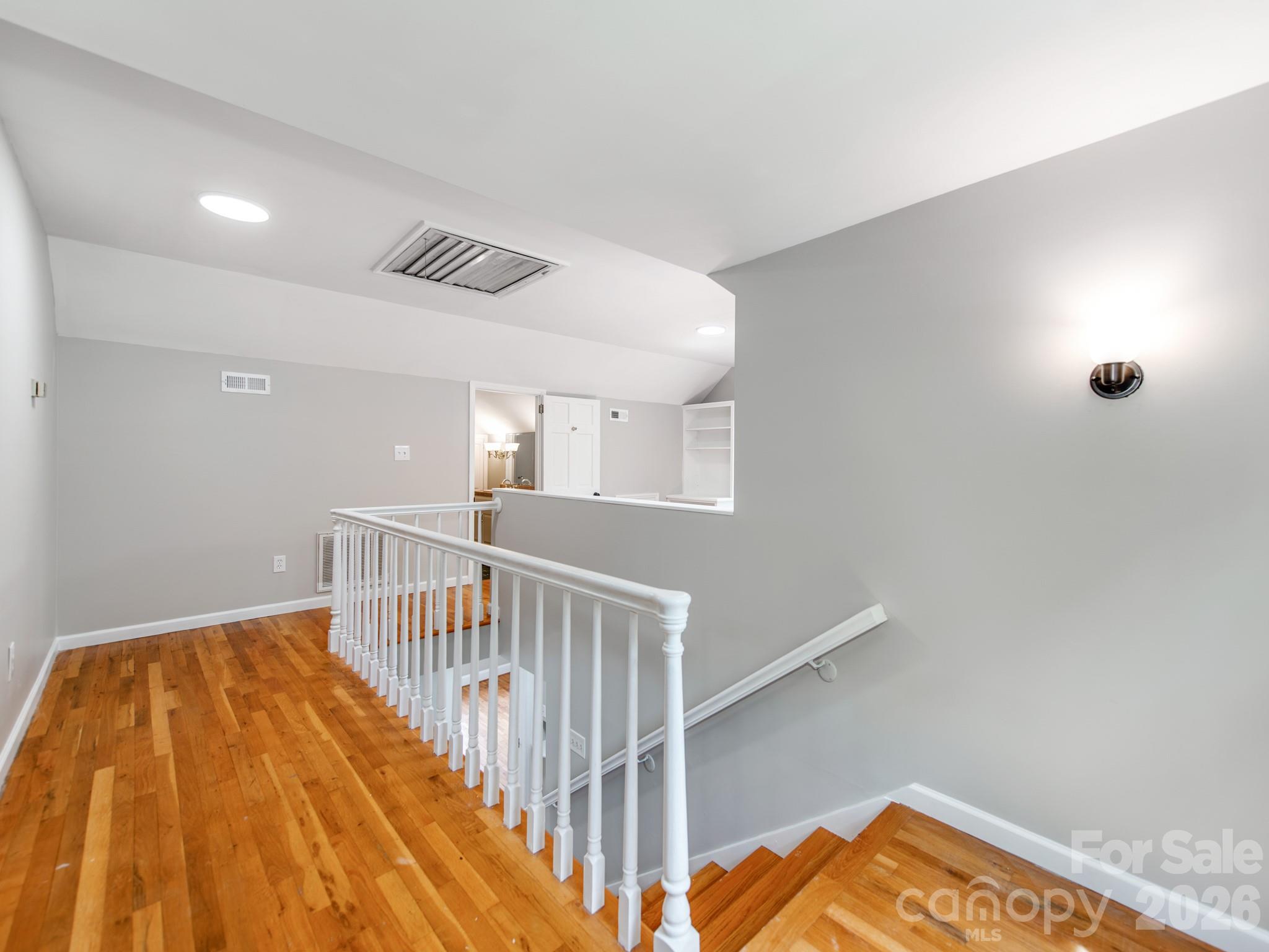 113 Falls Street Morganton, NC 28655 - Photo 16 of 33 a view of hallway with wooden floor