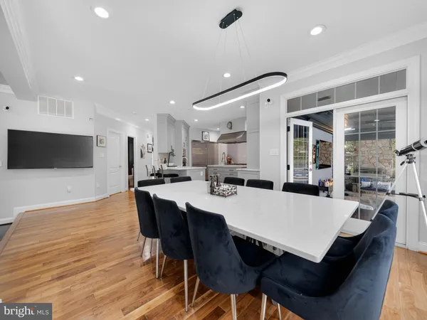a kitchen with stainless steel appliances granite countertop a stove and a sink