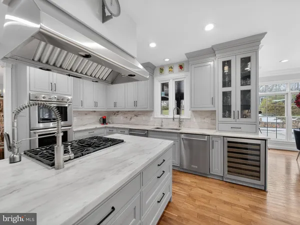 a living room with furniture and windows