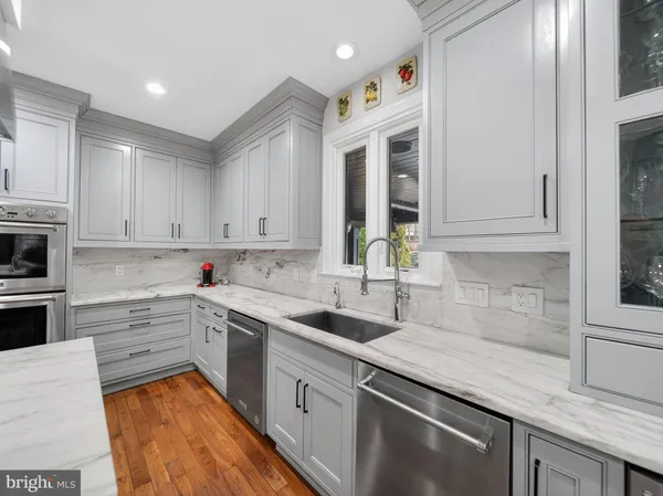 a bathroom with a toilet sink and shower