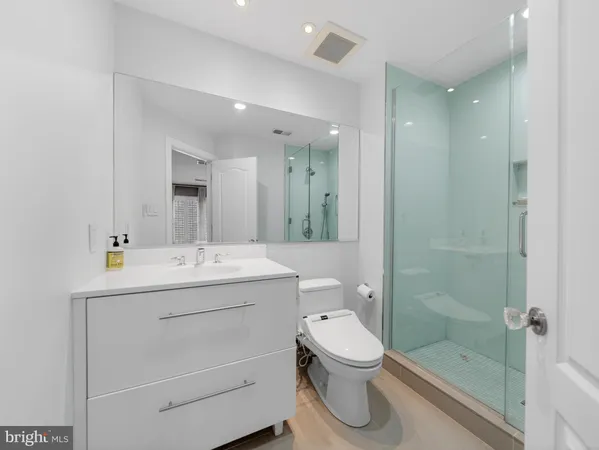 a room with gym equipment and a flat screen tv