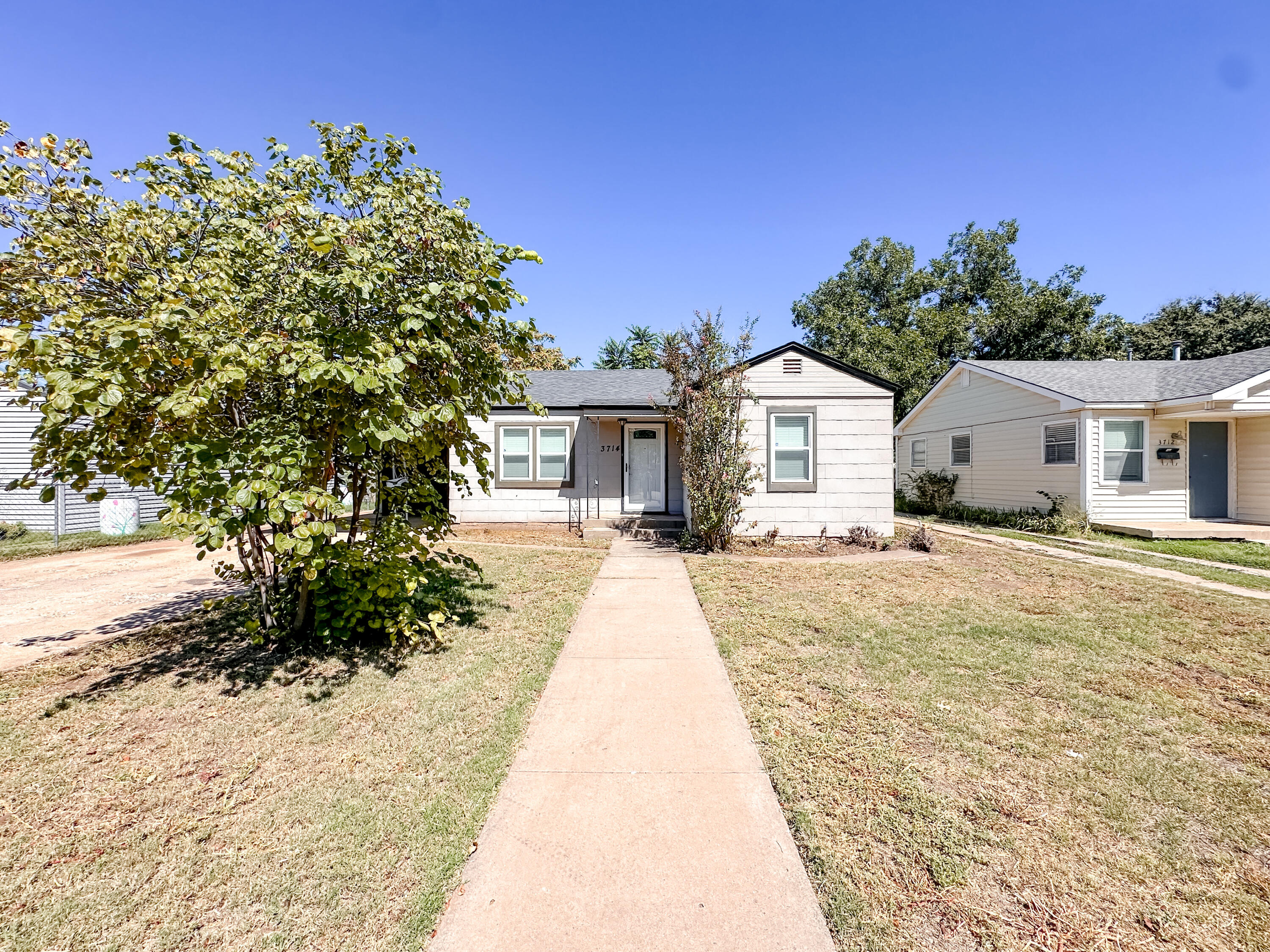 3714 26th Street Lubbock, TX 79410 - Photo 18 of 18 a view of house with yard