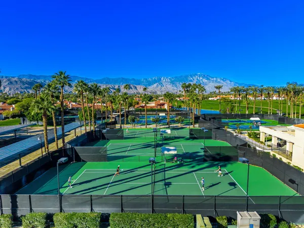 a view of yard with swimming pool outdoor seating and yard