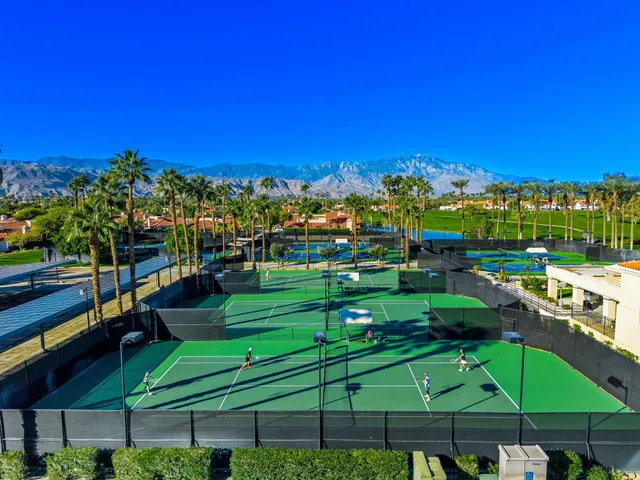 a view of yard with swimming pool outdoor seating and yard