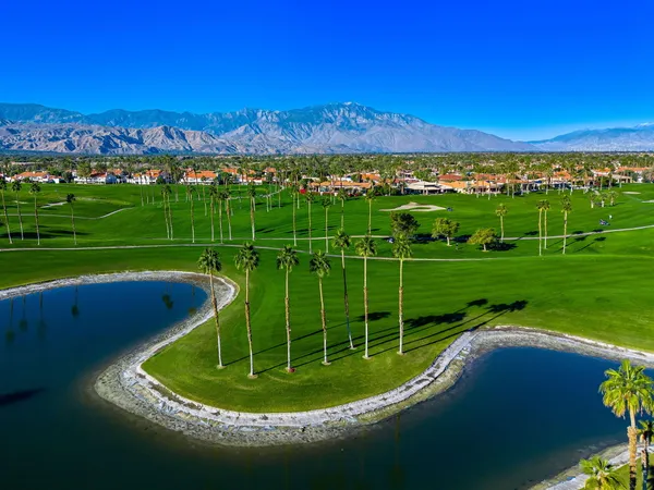 a view of a lake with a big yard
