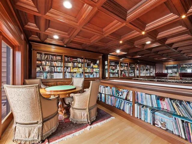 a view of a terrace with couches and sky view