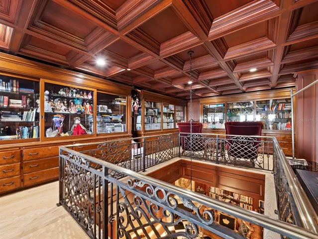 a view of a patio with swimming pool table and chairs