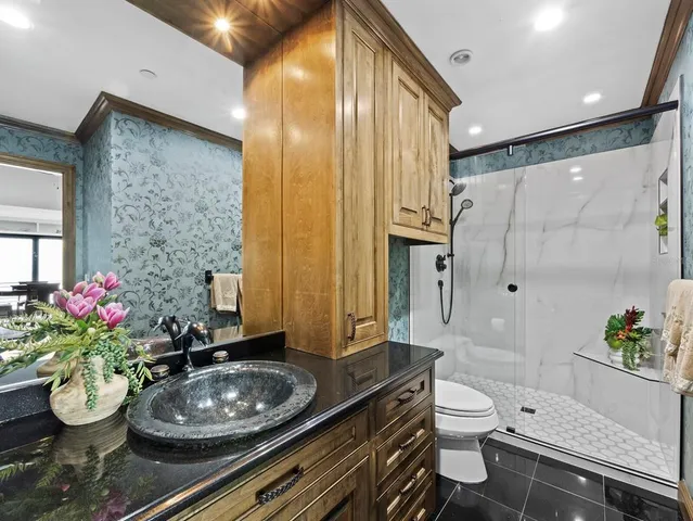 a view of a room with lots of gym equipment