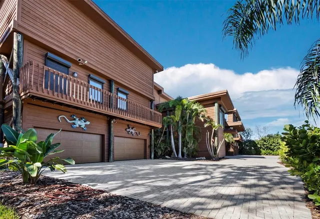 a view of entryway door with wooden floor