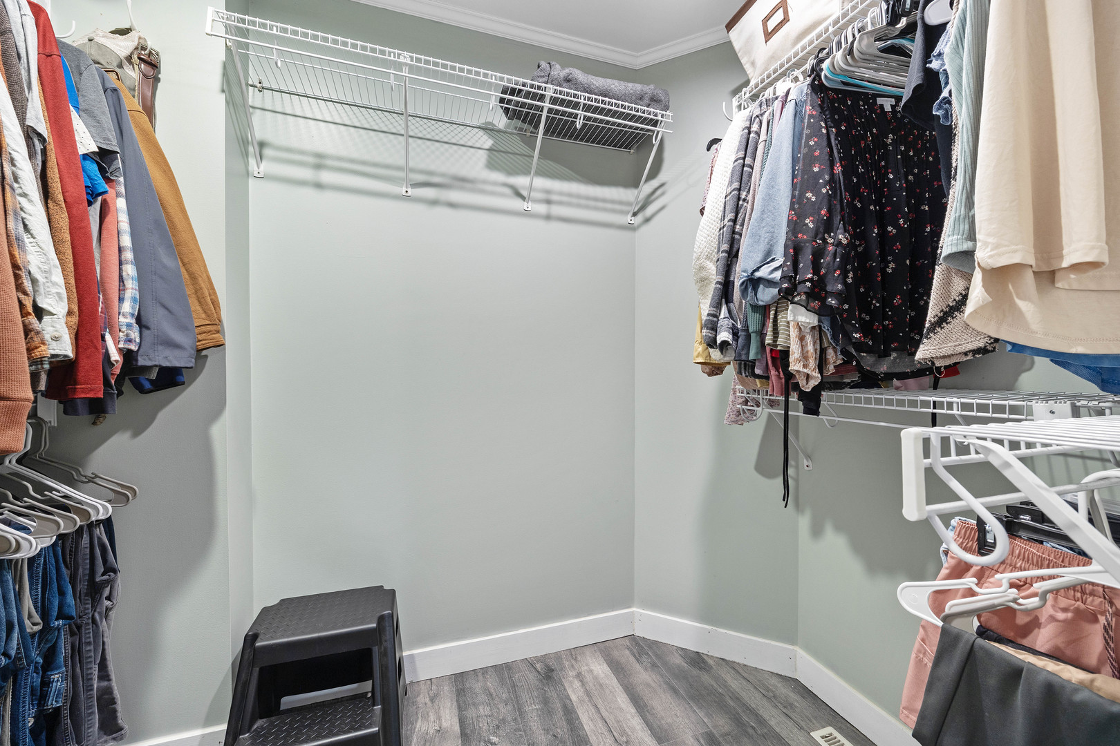 7308 West Lancaster Road Peoria, IL 61607 - Photo 21 of 55 a view of walk in closet with clothes and shoes