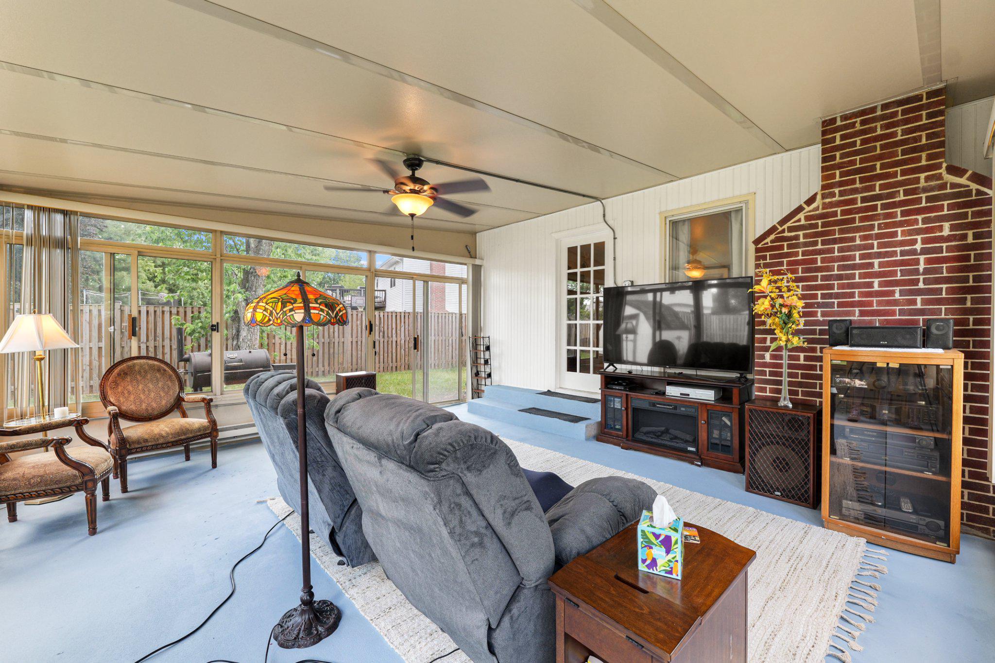 8871 Butternut Street Manassas, VA 20110 - Photo 21 of 29 3 season Sunroom with floor to ceiling windows.