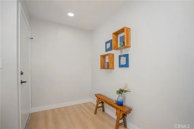 a room with table and a lamp