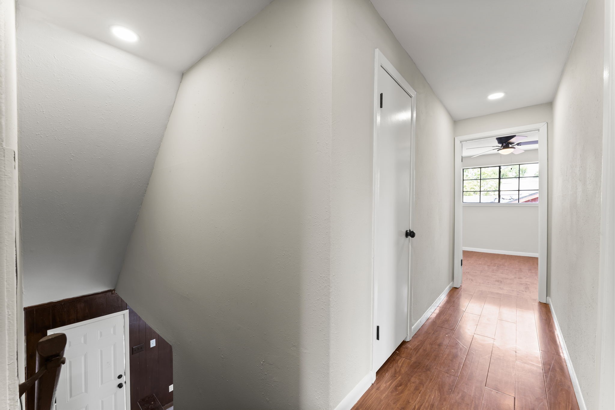 6918 Thornwild Road Houston, TX 77489 - Photo 14 of 21 a view of hallway with wooden floor