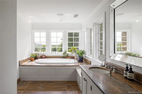 a living room with window and a table