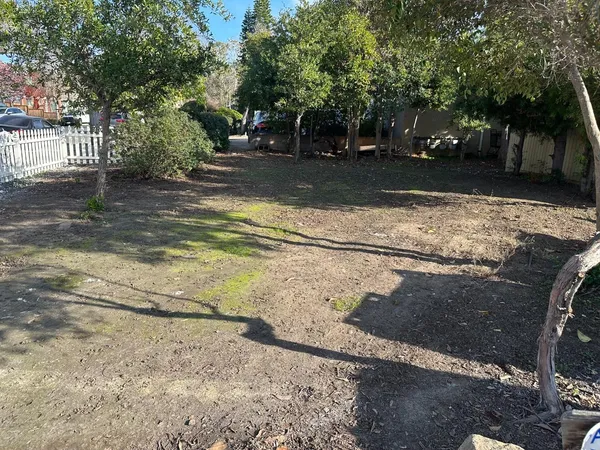 a view of a yard with an outdoor space