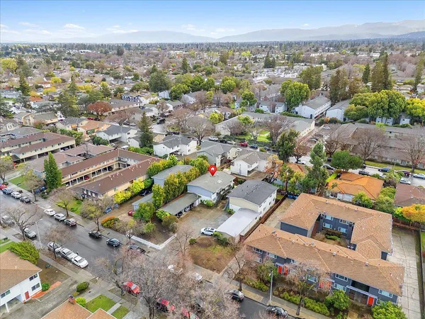 an aerial view of a city with lots of residential buildings