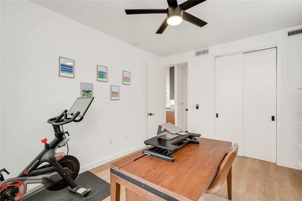 1208 Luna Street, Unit 1 Austin, TX 78721 - Photo 23 of 39 a room with gym equipment